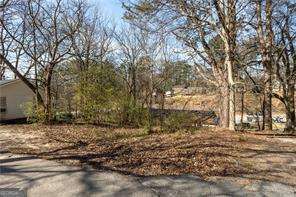 Investment Opportunity! DonCOt miss this investment opportunity in the heart of Canton, GA! Convenient location near shopping, dining, and major highways. Vacant lot currently Zoned GC could be possible lot for a duplex.