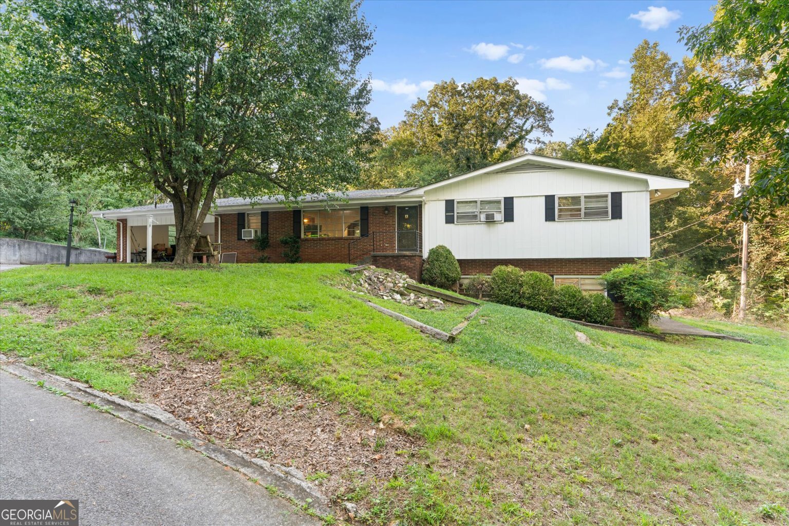Very Spacious Family Sized Home With Beautiful Overhead Beam Design!! 5 Bedrooms, 3 Full Baths, Full Finished Basement with 2nd Kitchen and bonus room. Kitchen with lots of cabinet space and stainless steel appliances. Stone fireplace in main level den, spacious laundry room, large backyard.