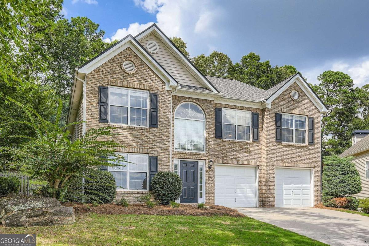 Beautiful two story traditional 3 bedroom, 2.5 bathroom home with great natural light in swim/tennis community. Don't wait to make this lovely home your own. The main level includes hardwood floors throughout, a foyer, a two story great room / living room, a separate dining room, kitchen, pantry, breakfast room, half bathroom, and two car garage. Upstairs features three bedrooms and two bathrooms including the oversized owner's suite, as well as the laundry room. Relax of entertain on the quiet back patio overlooking the fenced in yard. This home is in the sought after Vinings Cove with top notch amenities including a pool, clubhouse, tennis courts, and playground.