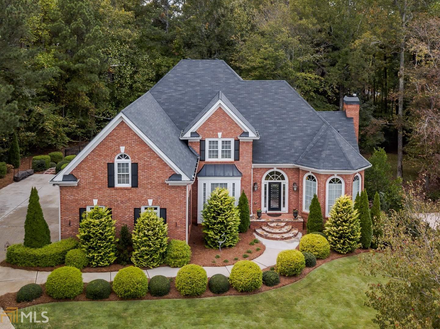 Rare Find; Immaculate Custom Brick, Master on Main w 3 Car Garage; Enviable Proximity to Amazing Amenities; Keeping Rm Kitchen w/ all the bells and whistles including Mega Center Island w/ Breakfast Bar; Stainless Steel Appliances w/ Gas Cooktop; Ovens / Microwave w/ Convection option; Vaulted Family Rm w/ Stacked stone Fireplace; NEW Windows; HVAC units only 7 yrs old; Hardwoods on Main; Pre Finished Hardwoods in Daylight Terrace; Multiple options (due to floorplan) for use as In-Law Suite w/ 2 Bedrms (1 w/ Living Rm); Full Bath; Family Rm w/ Gas Firepl; Card Rm; Covered Patio to Gorgeous Prvt Fenced Rear yard. Club Amenities include 6 lighted Tennis courts (ALTA) w/ viewing stands; 2 Pools (Swim Team); Kids splash park; 2 Firepits; Clubhouse for events; Playground.