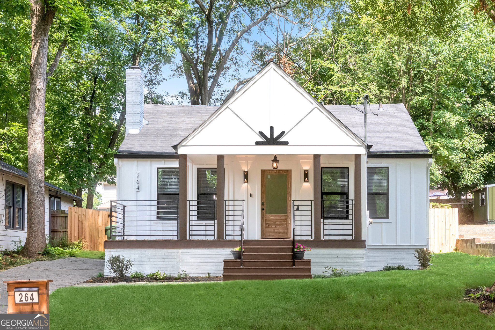Experience smart, stylish, and energy-efficient living in this fully reimagined 3BR/2BA Smart Home in the heart of Edgewood! Packed with tech upgrades and modern finishes, this move-in-ready home offers the perfect blend of comfort, innovation, and location. Enjoy a seamless open-concept layout with luxury vinyl plank floors, electric fireplace, and a striking leathered marble island. The chef's kitchen includes smart stainless appliances, soft-close cabinets, touchless gold faucet, porcelain sink, hidden trash storage, and a 4-burner range with air-fry and dehydrate functions. Control the home with voice or app via Google Hub, Alexa, Nest thermostat, Ring security, smart lighting, and keyless entry. Additional upgrades include EV charger, illuminated smart mailbox, double-pane insulated windows, attic fan + insulation, and Bluetooth-enabled outdoor speakers. The spa-inspired owner's suite features heated floors, a soaking tub, steam shower with bench, and a custom closet. Outside, enjoy a fully fenced backyard with stamped concrete patio and fog-lit smart lighting. Seller offering 3% flex cash ($20,970) toward closing costs, rate buy-down, or prepaids. Preferred lender offering $0 down and new 40-year mortgage (with approved credit) - reducing monthly payments by $600-$700! Plus home warranty included and seller financing available. Seller Financing Guidelines: Lower down payment options buyer must refinance within 24 months; Larger down payments client is willing to carry note for 6-7 years maximum. Ideal for owner-occupants, Airbnb hosts, or investors seeking co-living potential in one of Atlanta's fastest-growing tech-forward neighborhoods. This is more than a home, it's a fully connected lifestyle upgrade.