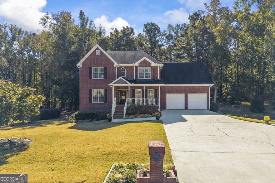 Gorgeous Three-Sided Brick Home in Amber Creek - No HOA! Welcome to this stunning two-story brick home featuring a rocking chair front porch and an unfinished basement with full bathroom completed and ready for you to customize the remaining rooms to your family's needs. Located in the desirable Amber Creek subdivision of Douglasville, this well-maintained neighborhood offers a peaceful setting with no HOA fees. Step inside the two-story foyer and be greeted by elegant formal living and dining rooms, ideal for entertaining. The inviting family room with fireplace flows seamlessly into the beautiful kitchen, complete with a tile backsplash, island, and breakfast nook. A half bathroom and laundry room are conveniently located on the main level. Enjoy hardwood floors throughout the main level, stairs, and upstairs landing, adding warmth and charm to every space. Upstairs, you'll find a spacious Owner's Suite with a spa-style bathroom featuring a separate tub and shower, double vanity, and private water closet. Three additional bedrooms and a full bathroom provide plenty of space for family or guests. Nestled on a beautifully landscaped .47-acre lot, this home boasts a long driveway, two-car garage, and a large deck overlooking a flat backyard -- perfect for outdoor gatherings and family fun. Come make this beautiful house your home!