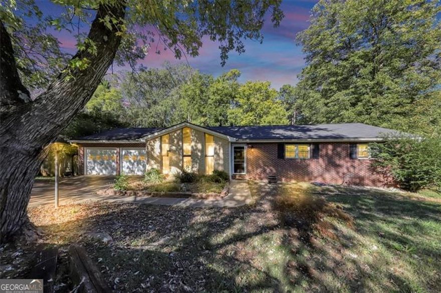 This home offers great potential with some TLC. Charming 3 bed, 2 bath home in desirable Philmont Estates on nearly half an acre! This property features a spacious flat, fenced-in backyard, large deck, and an unfinished basement with garage door access. Key updates include a roof less than 5 years old, a 3-year-old water heater, and HVAC from 2017. No HOA! Located in the excellent Cobb County school district. this home offers great potential with some TLC.