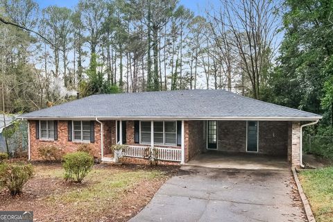 Photo of 1201 Valerie Woods Drive, Stone Mountain, GA 30083 (MLS # 10673847)