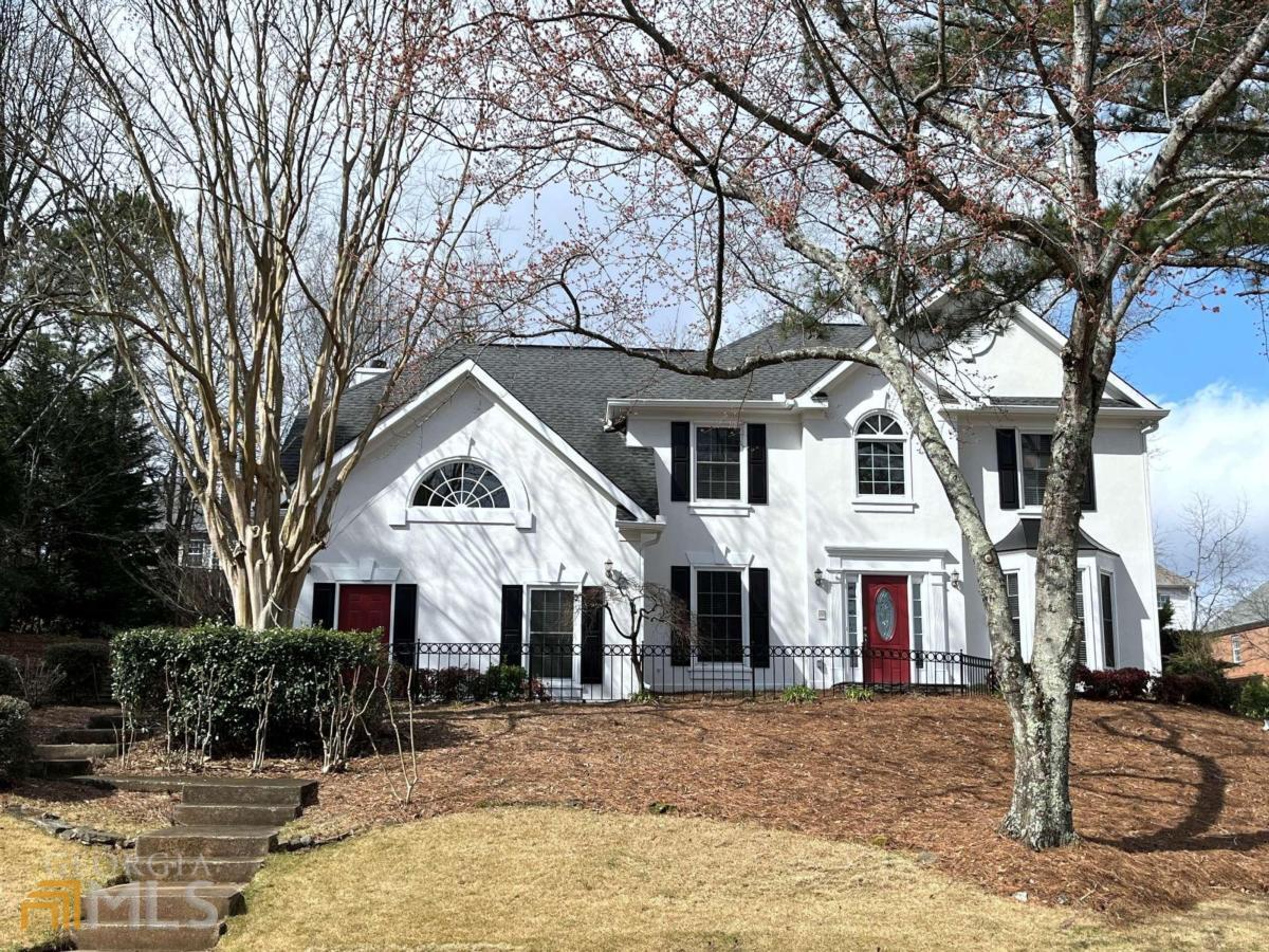 This gorgeous home has the interior AND exterior updates, along with all the flexible space today's buyers are looking for! Ready for quick closing and move-in! Freshly painted exterior, cement siding, hardcoat stucco front, architectural shingle roof, huge back yard shed, double paned windows, extra large 6" seamless gutters. Entire interior recently painted - walls, ceilings and trim/crown molding. Main level includes all new LVP flooring, new fixtures, lighting, ceiling fans, even knobs and hinges replaced throughout home. Fantastic floorplan includes 2-story foyer, formal living rm w/bay windows, formal dining rm w/tray ceiling, fireside family room/den, plus an additional office/flex room w/built-in floor to ceiling shelves & french door entry, updated kitchen, breakfast rm, half bath w/new low-flow toilet, and laundry room. Upper level has oversized primary suite with large walk-in closet, high ceiling, wall of windows; and includes huge updated bathroom with separate shower & tub, double vanity, private commode, and 2nd walk-in closet. 3 additional bdrms and updated full bath on upper level. Kitchen features white shaker cabinets, stainless appliances, island, solid surface counters, pantry, breakfast room w/bay windows, and open view to den. Den has gas fireplace, built in shelves, wall of windows, high ceilings, access to back patio. Entire house is bright, clean and has so much natural light! Side entry garage includes one side that is 2-stories to allow for custom storage or expansion of a bedroom on 2nd level. Driveway is level at garage and has space to park 3 cars. Back yard is tiered with 2 level areas. Located in sought after Northview HS cluster of Johns Creek, Laurelwood is part of the active Shakerag HOA with swim/tennis/playground/basketball amenities. Neighborhood swim team is open for registration now! Owner is a licensed agent in the state of Georgia.