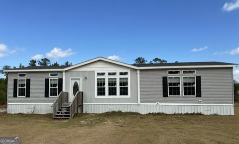 Photo of 2671 Fire Tower Road SE, Ludowici, GA 31316 (MLS # 10650261)