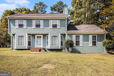 Photo of 7621 Raleigh Lane, Jonesboro, GA 30236 (MLS # 10599536)