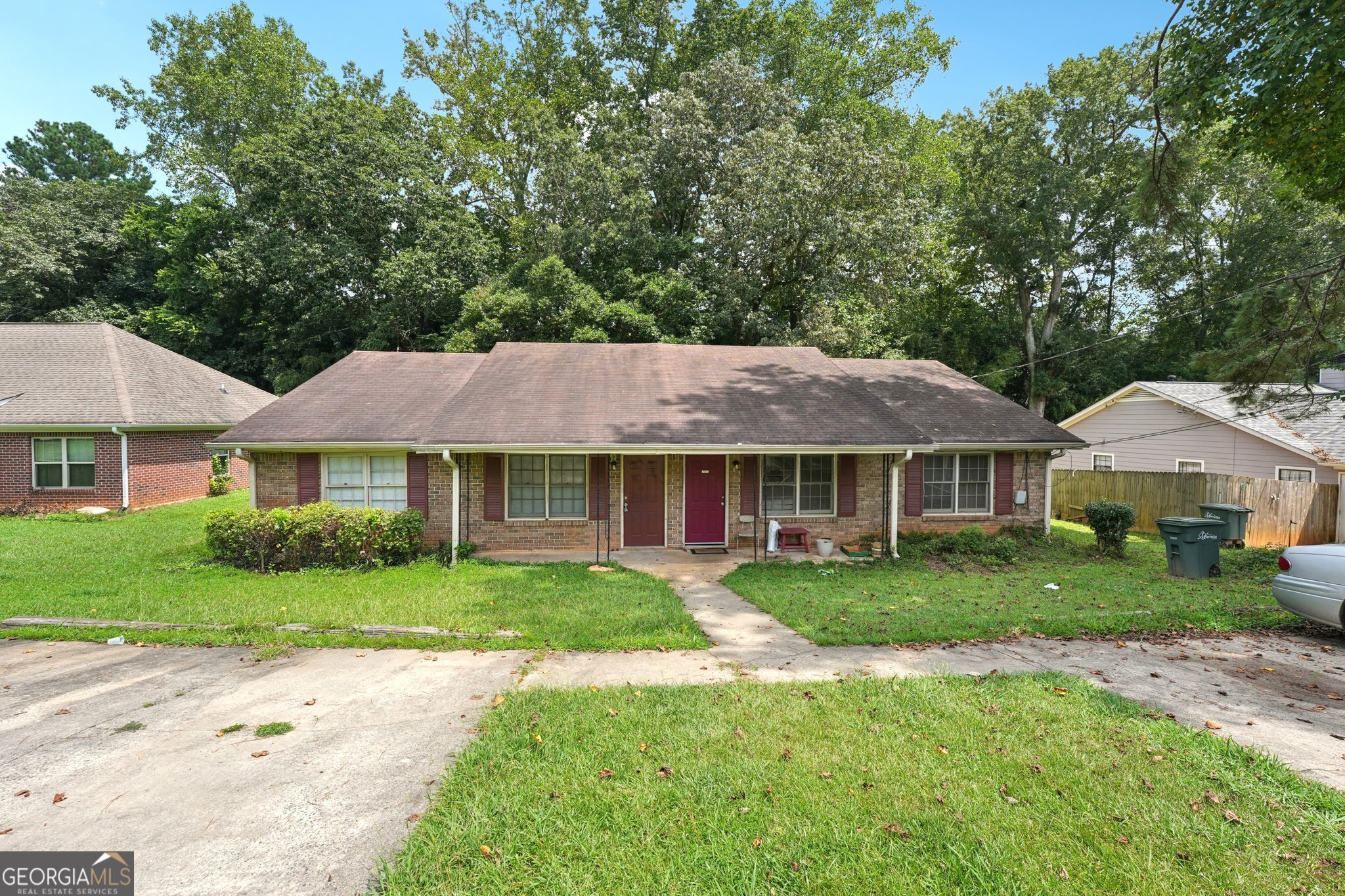 Ranch-style duplex offering two well-maintained units, each with 2 bedrooms and 1 bathroom. Both sides feature separate parking and private backyards, providing comfort and convenience for tenants. One unit also includes a screened porch, perfect for enjoying the outdoors year-round. This property is an excellent income-producing opportunity in a highly desirable location, just minutes from Marietta Square, shopping, dining, and major highways. Whether you're looking to expand your rental portfolio or house-hack by living in one unit and renting the other, this duplex offers flexibility and long-term value. Don't miss your chance to own a solid investment in one of Marietta's most sought-after areas!
