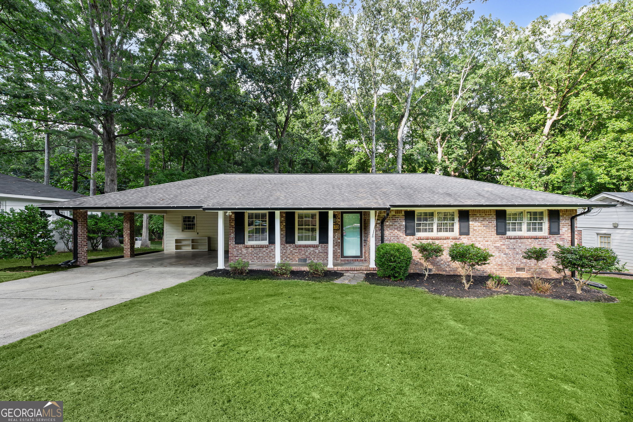 Welcome to 4470 Lake Ivanhoe Drive, a charming all-brick stepless ranch located minutes from shopping, dining, local parks, and quick access to both I-285 and I-85. This beautifully updated home offers a perfect blend of comfort, modern upgrades, and timeless style and is move-in ready. Also, it's Zoned for Livsey Elementary-a STEM-certified school. From the moment you arrive, you'll appreciate the low-maintenance brick exterior and inviting curb appeal. Inside, the home opens to a light-filled living room with gleaming hardwood floors, fresh neutral paint, large windows, and a ceiling fan for year-round comfort. The layout flows easily into the dining area and updated kitchen, creating a warm and functional space for everyday living and entertaining. The kitchen offers granite countertops, stainless steel appliances, crisp white cabinetry, and a cozy breakfast area overlooking the backyard. This home features two renovated bathrooms with stylish tilework, updated fixtures, and a clean, modern aesthetic. Your primary suite offers a peaceful retreat, while the two secondary bedrooms are bright, versatile, and ideal for guests, or a home office. Step outside to enjoy the backyard-perfect for pets, play, gardening, or weekend barbecues. A detached storage shed provides convenient space for tools and lawn equipment, and the 2-car carport adds covered parking and everyday ease. Additional features include a NEW A/C unit and newer gutters. Outdoor enthusiasts will love the home's proximity to several top-rated parks and recreational spots. Henderson Park, one of the highest-rated in the area, offers walking trails, a waterfall, tennis courts, soccer fields, and a community garden. Nearby Tucker Nature Preserve provides a peaceful escape with short hiking trails, beehives, and a pollinator meadow. Lake Erin Trails delivers scenic hikes with varying difficulty levels and is great for family outings. Kelley Cofer Park features a lake, playground, ball fields, swimming pool, orchard, and nature trails-all just a short drive away. For golf lovers, Heritage Golf Links is a nearby public course offering three nine-hole layouts and a driving range, perfect for practicing your swing or enjoying a weekend round with friends. If you're looking for a well-maintained, move-in ready home with timeless charm and modern upgrades, all on a single-level layout, this is the one. Don't miss your opportunity to own this updated stepless ranch in the heart of Tucker. Come experience 4470 Lake Ivanhoe Drive today-homes like this don't last long!
