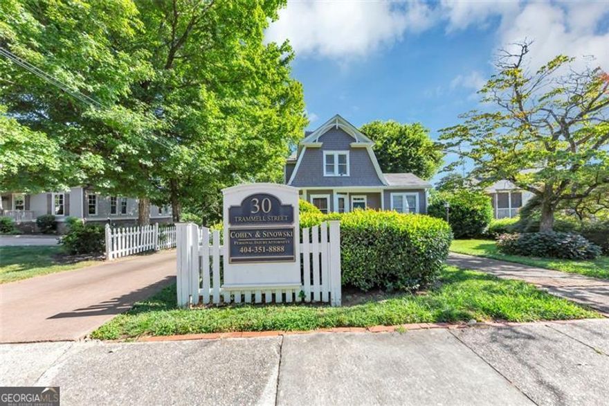 Welcome to 30 Trammell St SW, Marietta, GA 30064. An Historic Mixed-Use Complex Near Marietta Square just steps from the Marietta Square and within walking distance to the Cobb County Courthouse. This charming 1905 historic property offers a rare opportunity to own a piece of local history with modern-day functionality.  Currently operating as an attorney's office, the property features a classic layout with a thoughtful blend of historic charm and professional utility-including original moldings, a welcoming foyer, reception area, private offices, and bathrooms.  Zoned O/I (Office/Institutional), the property cannot be rezoned, but a variance may be obtained to allow for residential use, making this an excellent live/work opportunity or a chance to convert the space back to a private residence. Additional highlights include: Ample rear parking  Second private entrance for added convenience  Excellent visibility and accessibility in the heart of Marietta. Whether you're seeking a boutique professional space or a flexible mixed-use opportunity, this property delivers timeless value in an unbeatable location.