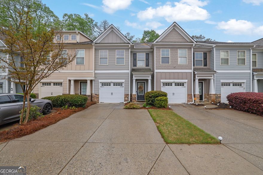 Price Reduction!!!! Ideal location in Alpharetta with Forsyth County taxes and top rated schools! Close to 400 shopping and Halcyon. This fabulous townhome has it all. 2 bedroom 2 full bathrooms and half bath. Kitchen has white cabinets, granite countertops, custom built ins, open floor plan, stainless steel appliances. Spacious primary bedroom with walk in closet, secondary bedroom is spacious with walk in closet and full bathroom.  Family room has a fireplace, custom white shutters overlooking a patio fenced in backyard. Ask about the Armadillo Home Warranty...Come see it today!