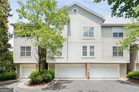 Photo of 4248 River Green Drive NW #302, Atlanta, GA 30327 (MLS # 10798263)