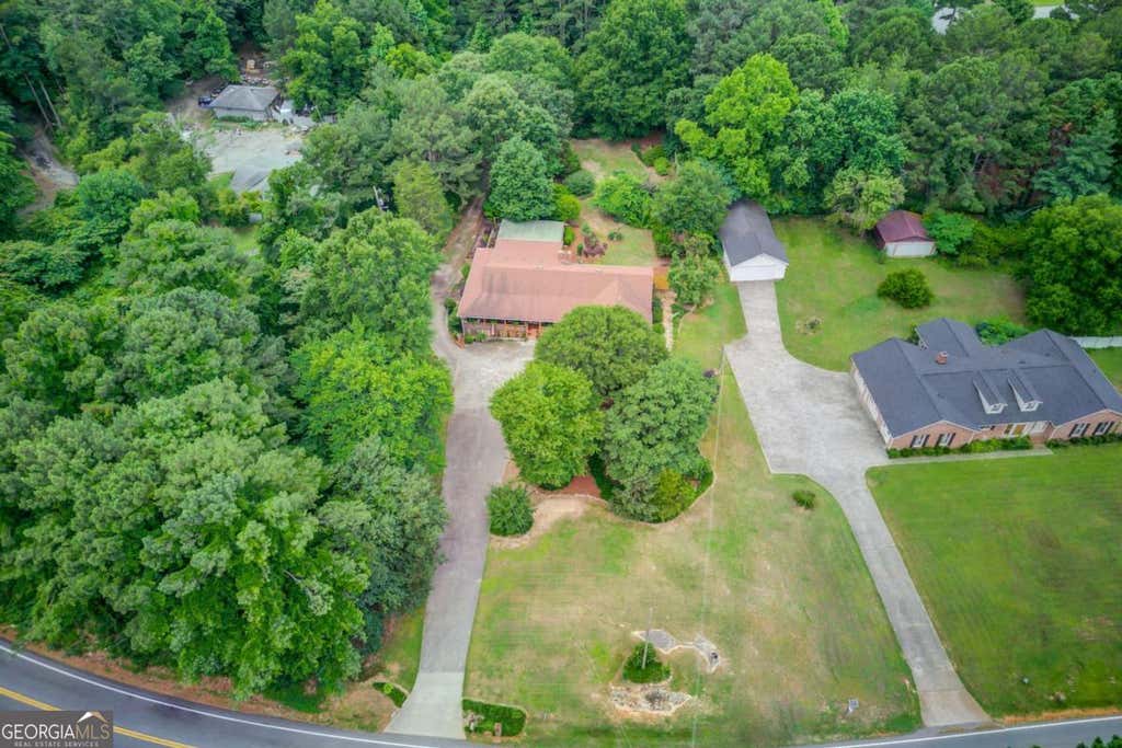 Photo of 2521 Stone Drive SW, Lilburn, GA 30047 (MLS # 10782230)
