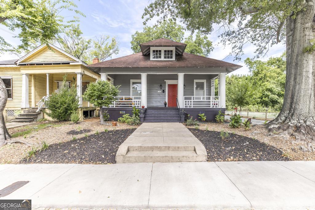 Charming 1920s Cottage for Rent - $1,375/Month! Step into vintage charm with all the modern updates in this completely renovated 1920s cottage! This adorable home features original decorative fireplaces, soaring 10-foot ceilings, and stunning pine hardwood floors that give it timeless character. The open-concept layout includes a cozy living room, dining area, and a beautifully updated kitchen-perfect for everyday living and entertaining. Offering three spacious bedrooms and two updated bathrooms, this home combines comfort and functionality in a location that can't be beat-just minutes from Mercer University and downtown Macon. Also listed for sale for $145,000