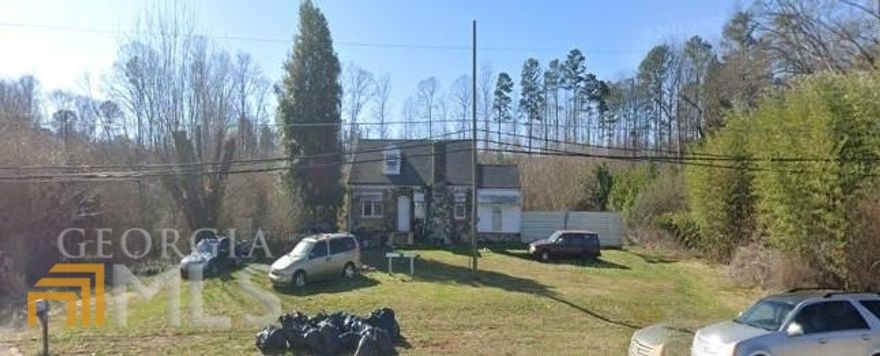 Motivated Seller will consider all reasonable offers.    There is a home on the property that with some TLC could be rented.  Property is ideal for a townhome complex or other residential development.