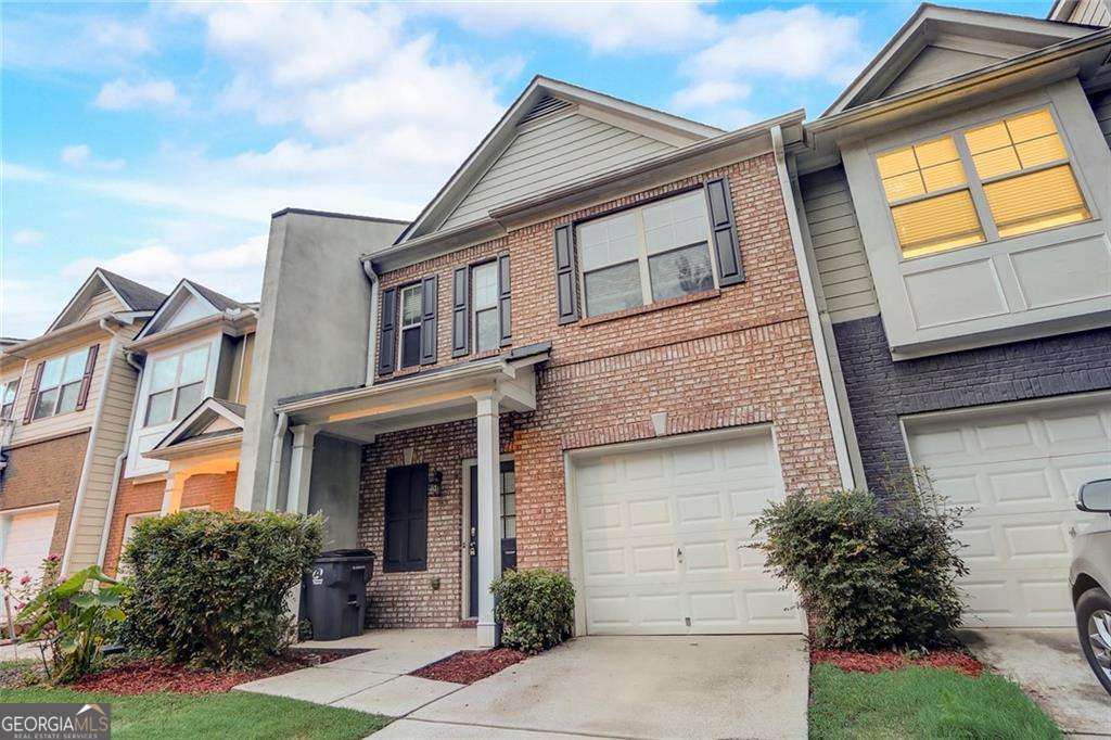 Welcome Home! You'll fall in love with this stunning 3-bedroom, 2.5-bathroom home in Suwanee, located in a quiet neighborhood yet conveniently situated in a prime location close to restaurants, shopping, and entertainment. With easy access to I-85 and a highly rated school district, this home perfectly balances comfort and convenience. Inside, enjoy a stylish kitchen featuring stainless steel appliances, ample cabinetry, and generous counter space-ideal for meal prep and entertaining. The open floor plan boasts beautiful hardwood floors, abundant natural light, and a neutral color palette, creating a warm and inviting atmosphere throughout. The spacious primary suite offers a relaxing retreat with a luxurious bathroom showcasing dual sinks, a separate tub, and a walk-in shower. Additional bedrooms provide versatility for family, guests, or a home office. Step outside to your private backyard oasis, perfect for gatherings, grilling, or simply enjoying a quiet evening. Don't miss your chance-this move-in-ready home in one of Suwanee's most desirable areas will not last long!