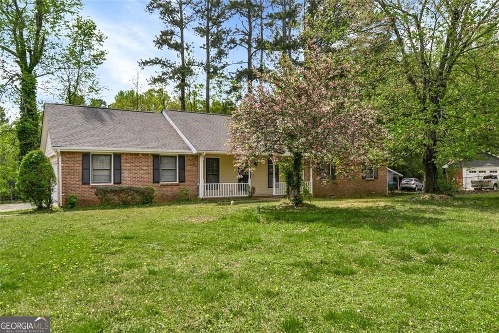 Photo of 5284 Wydella Road SW, Lilburn, GA 30047 (MLS # 10726686)