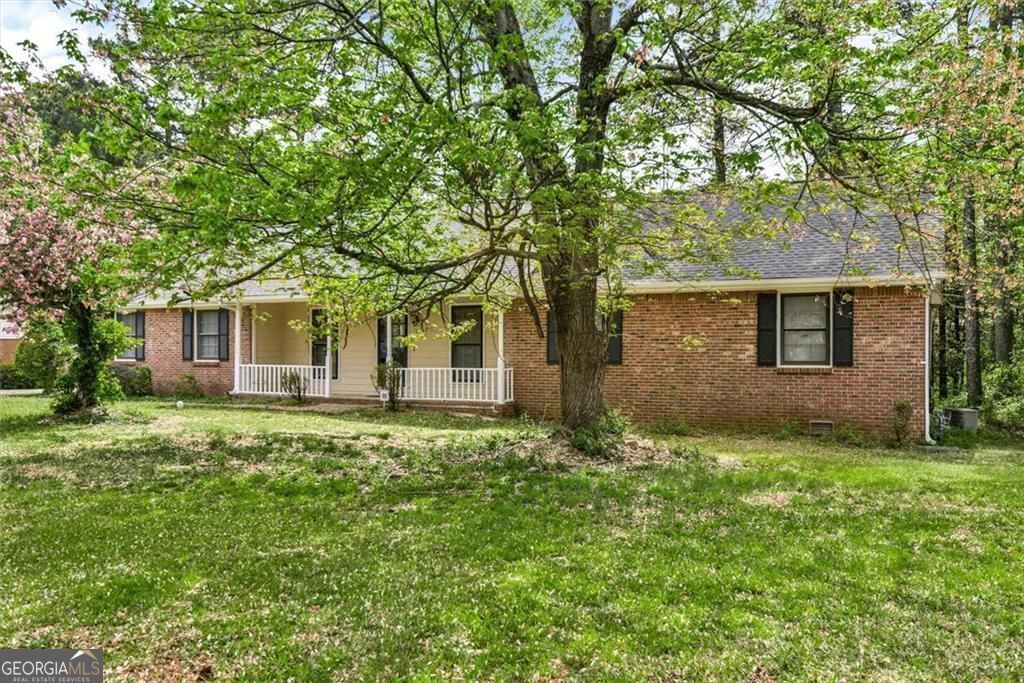 Photo of 5284 Wydella Road SW, Lilburn, GA 30047 (MLS # 10726686)
