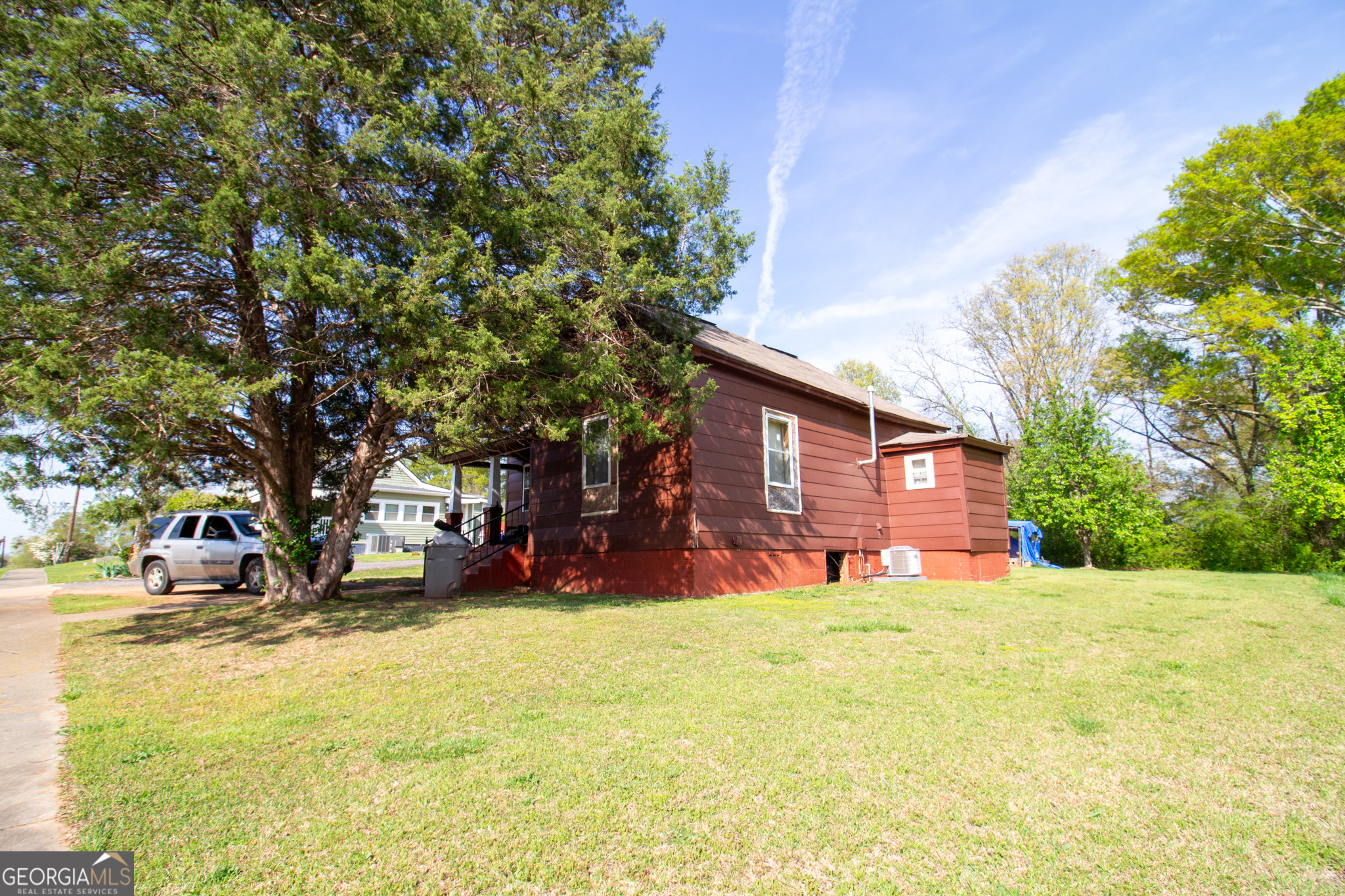 Cozy two bedroom, one bath home in the heart of LaGrange. Home is filled with potential and is perfect for those looking to put their personal touch on a property. While it needs some TLC, it has an approximately two year old HVAC and water heater. With a comfortable living area and inviting front porch, this home is being sold as-is allowing you to customize and transform it to suit your style. This could be an excellent investment property!