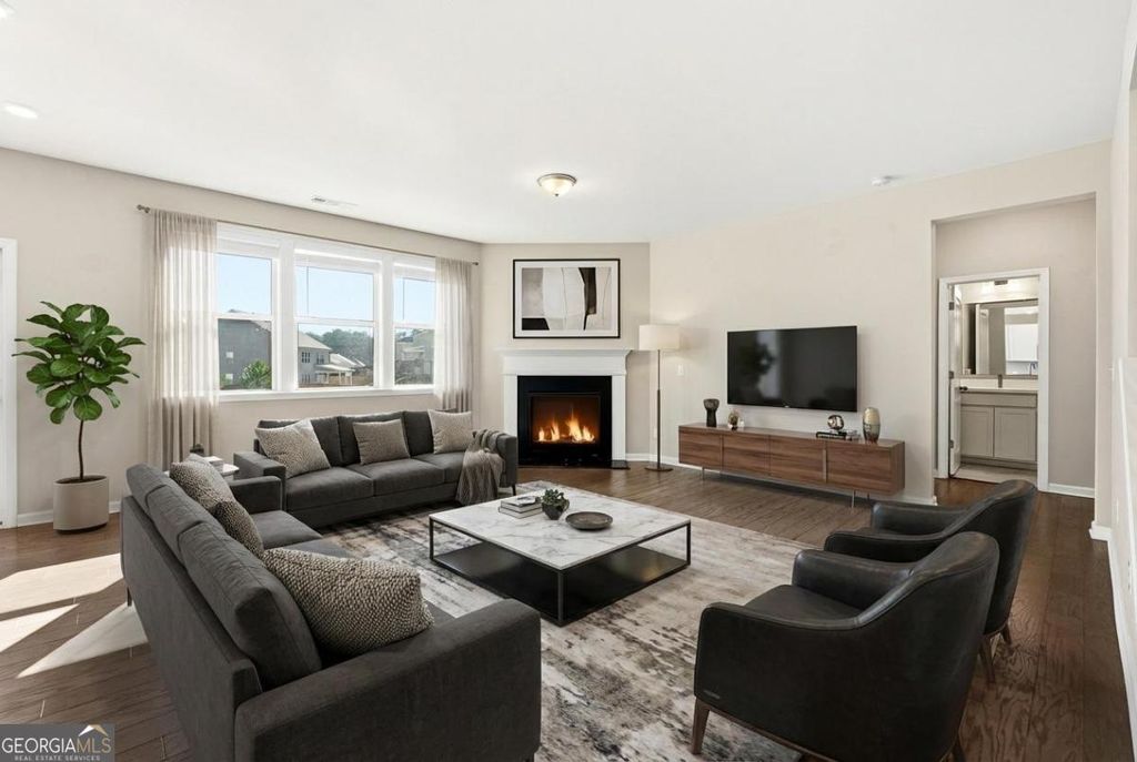 Photo of 156 Round Pond Drive, Lilburn, GA 30047 (MLS # 10695159)