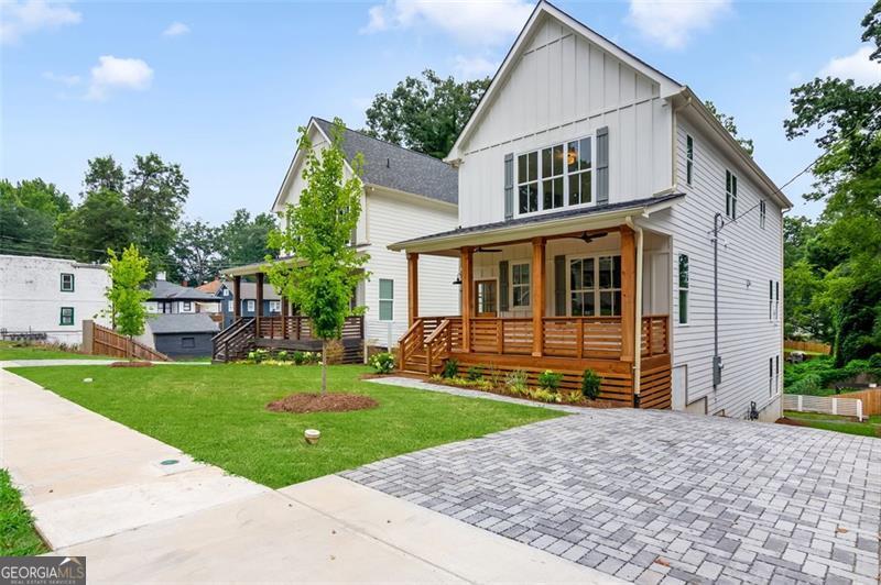 PRICE ADJUSTMENT- FRESHLY RELISTED! Welcome to 830 Gaston Street, where luxury meets comfort in this impressive new construction home! This twin built home created and imagined by 1stDoor is a one of a kind in what is the burgeoning neighborhood of Oakland City! Boasting 3,600+ square feet of finely crafted living space, this residence offers 5 spacious bedrooms and 4 elegant bathrooms, ideal for a growing family or anyone seeking a flexible, spacious layout. From the moment you step through the door, you're greeted by an open, airy floor plan designed to capture natural light and create a warm, inviting atmosphere. The gourmet kitchen is a chef's dream, featuring premium stainless-steel appliances, quartz countertops, a large center island, and abundant cabinetry-perfect for everything from weekday dinners to large gatherings. Adjacent to the kitchen is a cozy dining area and an expansive living room with large windows that frame the scenic backyard. The finished basement adds tremendous value, providing versatile space that could serve as a home theater, game room, or guest suite. There is also a full bedroom and finished bathroom in the basement. Each bedroom is generously sized with ample closet space, and the primary suite includes a spa-like en-suite bathroom with a soaking tub, walk-in shower, and double vanities for a true retreat experience. Outside, the large backyard offers endless possibilities for outdoor living and entertaining-imagine summer barbecues, gardening, or simply unwinding under the open sky. With close proximity to schools, parks, and shopping, 830 Gaston Street combines luxury, comfort, and convenience in a single stunning package. Don't miss the chance to call this extraordinary property your home!