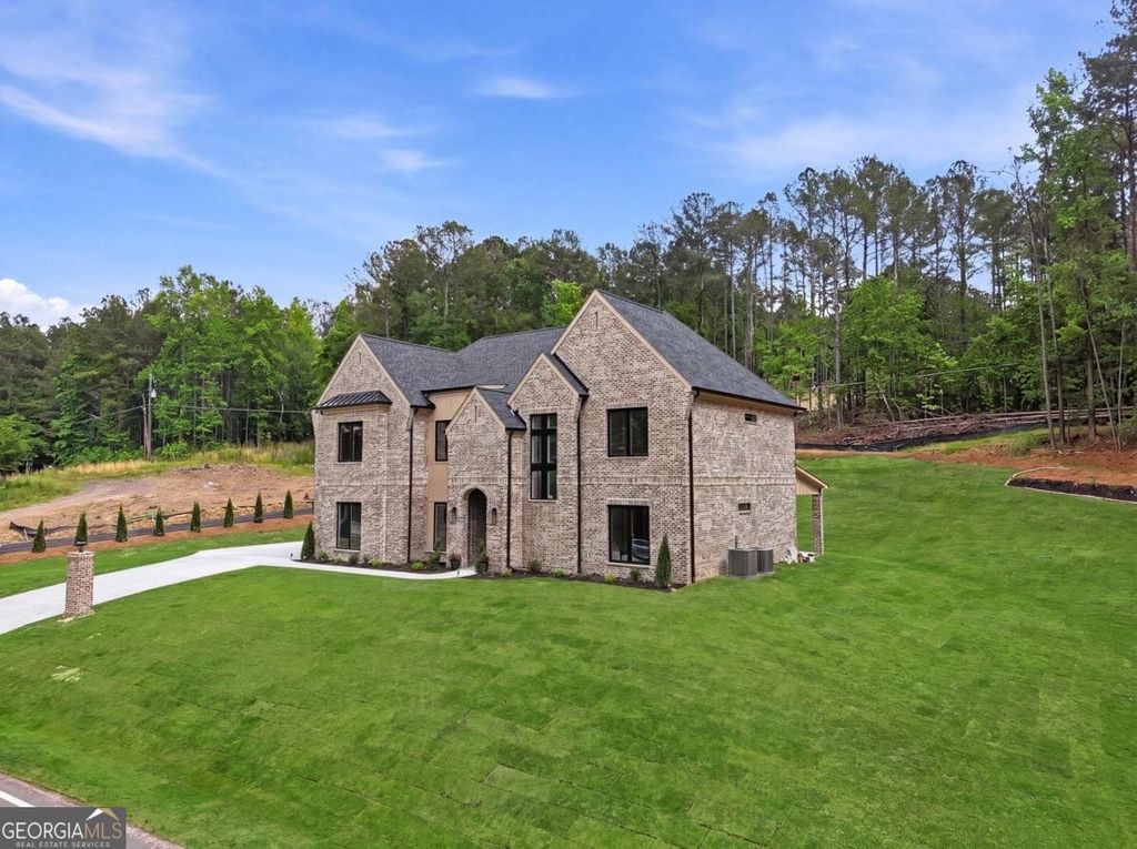 Photo of 1557 Whitley Rd, Dacula, GA 30019 (MLS # 10762246)
