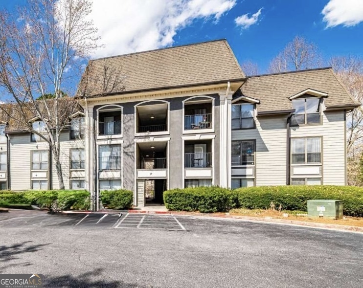 This well-kept 2-bedroom, 2-bath condo has it all! Step inside to a bright open living area with a kitchen that overlooks the main space, making it ideal for both everyday living and entertaining. A private balcony extends the living area outdoors, perfect for morning coffee or evening relaxation. The primary suite offers a private bath, while the second bedroom provides flexibility for guests, an office, or a roommate. The location is spectacular: enjoy easy access to Buckhead's premier shopping and restaurants, quick connections to I-85 and GA-400, and nearby sidewalks for walking both inside and outside the community. Shady Valley Park and public transportation are also close by. The community features gated access, a lovely pool and cabana, and an extremely pet-friendly atmosphere. With reasonable HOA fees, incredible amenities, and a price set to sell, this home is a rare opportunity to enjoy Buckhead living at its best.