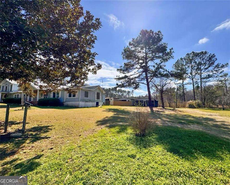 GREAT INVESTMENT OIPPORTUNITY IN SOUTH GEORGIA Located in a prime area of South Georgia, almost to the Florida line, this property offers a unique investment opportunity for investors seeking a high return potential. Situated in a high-value area with excellent year-round-weather, this spacious home features 6 bedrooms and 4 bathrooms, sitting on a generous 1 acre lot perfect for profitable renovation. With a solid structure and smart layout, this home is ideal for a fix an flip project. weather your looking for a short term flip or a valuable investment to add to your portfolio, this is the kind of property that won't last long. Don't miss the chance to invest in a growing area with strong demand!