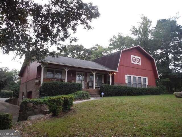 Corner Lot of Sandy Plains and Trickum Rd. Great school district, CVS is right across the street. Lot can be sold individually or with adjoining lot at 3061 Sandy Plains Rd. total of 2 acres for 1,680000.Currently zoned R-15 and potential commercial. Private: