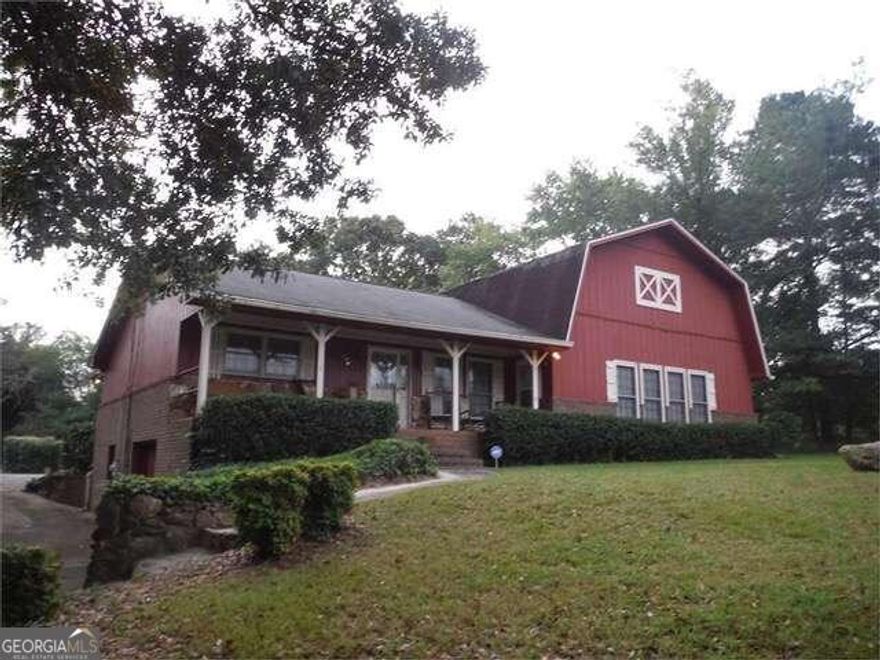 Corner Lot of Sandy Plains and Trickum Rd. Great school district, CVS is right across the street. Lot can be sold individually or with adjoining lot at 3061 Sandy Plains Rd. total of 2 acres for 1,680000.Currently zoned R-15 and potential commercial.   Private: