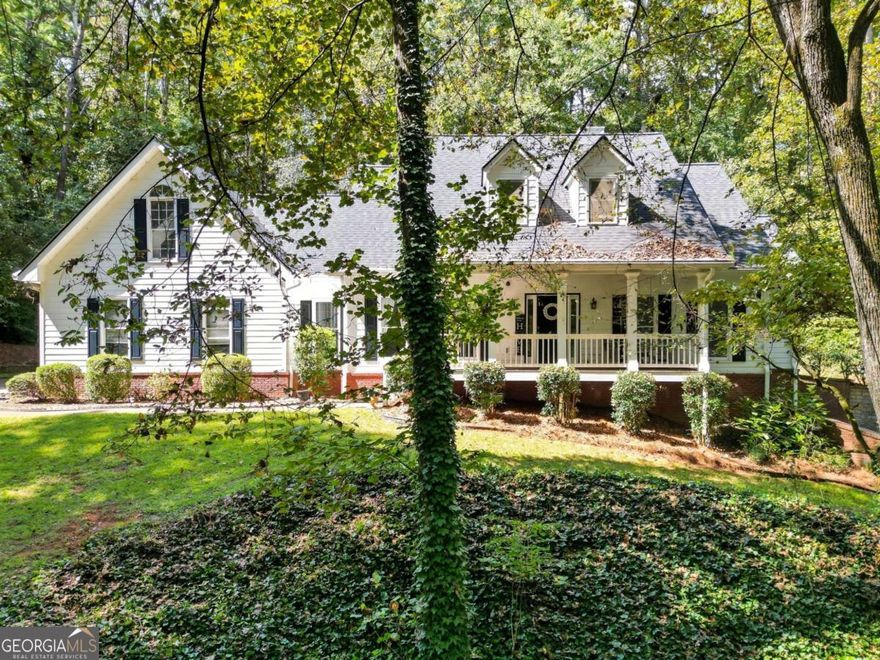 Welcome to your slice of paradise in Woodstock! This expansive 7-bedroom, 3.5-bath ranch with a bonus room and finished basement offers nearly 4,400 sq ft of living space on just under 2 private acres, perfectly blending comfort, elegance, and versatility.    The spacious owner's suite on the main level is a true retreat, complete with a spa-inspired en-suite bath and generous closet space. At the heart of the home, the open-concept kitchen shines with stainless steel appliances, granite countertops, custom cabinetry, stylish backsplash, and an island with bar seating. The adjoining dining area and vaulted living room with a cozy fireplace make entertaining effortless.    Enjoy year-round comfort in the oversized sunroom with a mini-split system, ideal for morning coffee or peaceful afternoons overlooking your lush backyard. Upstairs, a flexible bonus room provides endless options for a home office, playroom, or creative studio.    The opposite wing of the home features three additional bedrooms and a full bath, plus a dedicated laundry room and two-car garage. Step outside to a private paver patio with pergola, perfect for dining under the stars. A tranquil creek with a charming walking bridge adds a one-of-a-kind outdoor escape.    The fully finished basement apartment is a rare gem, featuring 2 bedrooms, a full kitchen, bath, laundry, private entrance, and dedicated parking-perfect for guests, multi-generational living, or rental income opportunities.    Set in a peaceful, friendly community, this property offers both privacy and convenience, with shopping, dining, entertainment, and nature trails just minutes away.    This is more than a home-it's a lifestyle. Don't miss the chance to make it yours!