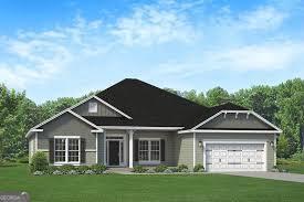 Treetop now selling Phase 2! Great location by Lake Tobe! Open House every weekend from 2-5pm! The 2620 floorplan by Adams Homes is a spacious and well-designed two-story home that offers 4 bedrooms, 3 bathrooms, and a 2-car garage. With its thoughtful layout and beautiful architectural features, this floor plan provides a perfect balance of functionality and style. As you enter the home, you are greeted by a welcoming foyer that directly leads into the formal dining room. On the other side, there is a versatile room with a full bath that can cater to your personal needs. The expansive family room is perfect for relaxing or entertaining, and it flows into the kitchen area, creating a cohesive space for family meals and gatherings. The kitchen in the 2620 floorplan is a chef's delight. It features a large center island with a breakfast nook, providing additional seating and workspace. The ample cabinet and countertop space ensure that you have all the storage and preparation area you need. High-quality appliances and stylish finishes add a touch of elegance to the space, making it a focal point of the home. The split bedroom configuration allows every family member to have their own private space. The master suite comes well-adorned with a soothing soaking tub, dual vanity, and spacious walk-in closet. The additional two bedrooms are tucked off of the kitchen and include abundant closet space and a shared bathroom. The 2620 floorplan exemplifies Adams Homes' commitment to quality craftsmanship and attention to detail. It is the perfect opportunity to own a beautiful home that meets your needs and exceeds your expectations.