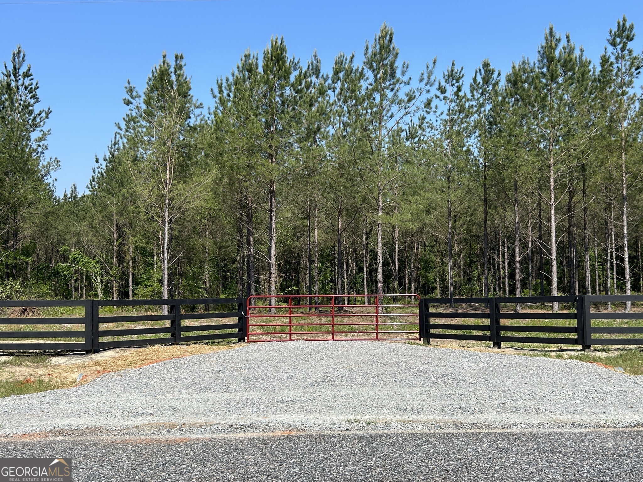Bluewater offers 19 beautiful country homesites, providing the perfect setting to embrace a laid-back rural lifestyle. Lot #11 features 3.044 acres of fully wooded land, with a small creek along the back property line, creating a peaceful retreat where nature abounds right in your backyard. This quiet, gated community offers protective covenants, a paved road entrance, and is located in an excellent public school district, making it an ideal place to raise a family. While you'll enjoy the tranquility of country living, you're also just minutes from the charming shops, dining, and entertainment of downtown Dublin, as well as only 6 minutes from Interstate 16, placing you conveniently halfway between Atlanta and Savannah. With a thriving local community and strong job growth in the area, Bluewater offers the best of both worlds-country comfort with small-town convenience.
