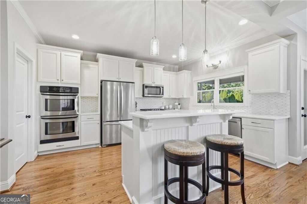 Photo of 619 Blackwater Ridge, Canton, GA 30114 (MLS # 10624772)