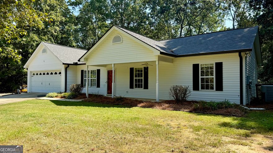 Great Location in Lula, GA! Conveniently located just minutes from Highway 985, this charming 3-bedroom, 2-bath home is perfect for commuters and offers the ideal blend of comfort and convenience. Step inside to an open floor plan with vaulted ceilings that create a spacious and airy feel. The kitchen and living areas flow seamlessly-perfect for entertaining or relaxing with family. The master bedroom features its own en suite bathroom, providing a private retreat. Two additional bedrooms and a full bath are ideal for children, guests, or a home office.Enjoy peace of mind with a fully fenced backyard-perfect for kids to play safely or for your furry friends to roam freely. A dedicated laundry room adds extra functionality and a 2 car garage is a perfect addition.   Whether you're a first-time homebuyer or looking to downsize, this home is a fantastic choice in a prime location. Don't miss out!