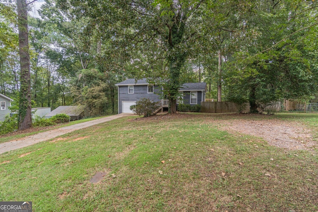 Photo of 4996 Wycliffe Drive, Stone Mountain, GA 30087 (MLS # 10873807)