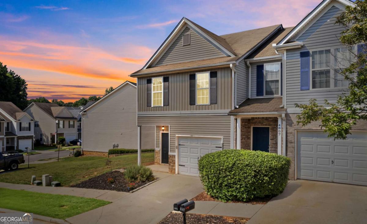 Welcome to Waterstone Crossing - Comfortable Living Near the Heart of Flowery Branch Discover the charm of Waterstone Crossing, a well-established and serene community located just minutes from downtown Flowery Branch, Lake Lanier, UNG's Lanier Campus, and exit 12 at I-985. Enjoy nearby shopping, dining, and easy access to top-rated schools. This desirable end-unit townhome, located on a corner lot, offers additional privacy and a low-maintenance lifestyle with no rental restrictions. The community features a pool, playground, sidewalks, and streetlights, with the HOA covering lawn care for worry-free living. Inside, the home boasts an open floor plan with 3 bedrooms and 2.5 bathrooms. The spacious kitchen includes a pantry and eat-in dining area, flowing into a cozy family room with a gas fireplace and access to the private rear patio-perfect for relaxing or entertaining. Upstairs, you'll find all bedrooms and a conveniently located laundry room. HVAC replaced May 2023. Don't miss your chance to own in one of Flowery Branch's most accessible and well-loved communities!