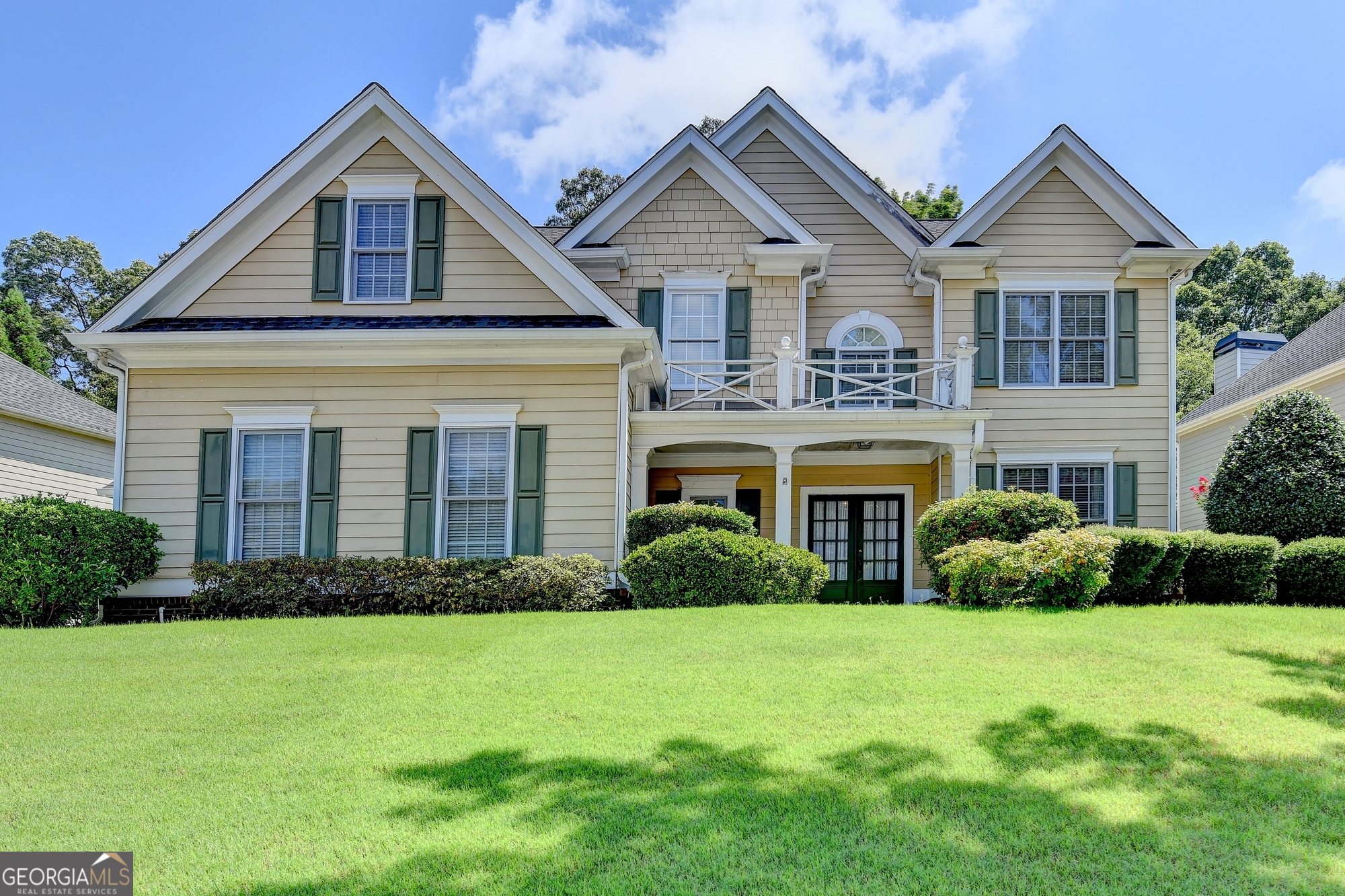 Beautiful home in the Hamilton Mill Community. The neighborhood features a golf course, swimming pool, tennis courts, pickleball, ball field, playground, and more. This home features an oversized master suite with tray ceilings, walk-in closet, double vanity, separate shower and tub. Three additional bedrooms are spacious. The kitchen has an open view to the family room which features a two-story ceiling, built-in bookcases, and a fireplace. There is a breakfast area and a separate dining room. Another room can be used as an office, sitting area, library, or multiple other uses. Outside, the lawn is well landscaped. The backyard features two different areas: a backyard right off the patio, and steps leading up to a flat area that could be used for gardening, entertaining, or recreation. Home being sold As-Is. Located near shopping, restaurants, and schools, and conveniently located near I-85 and just a few minutes from the Mall of Georgia area.