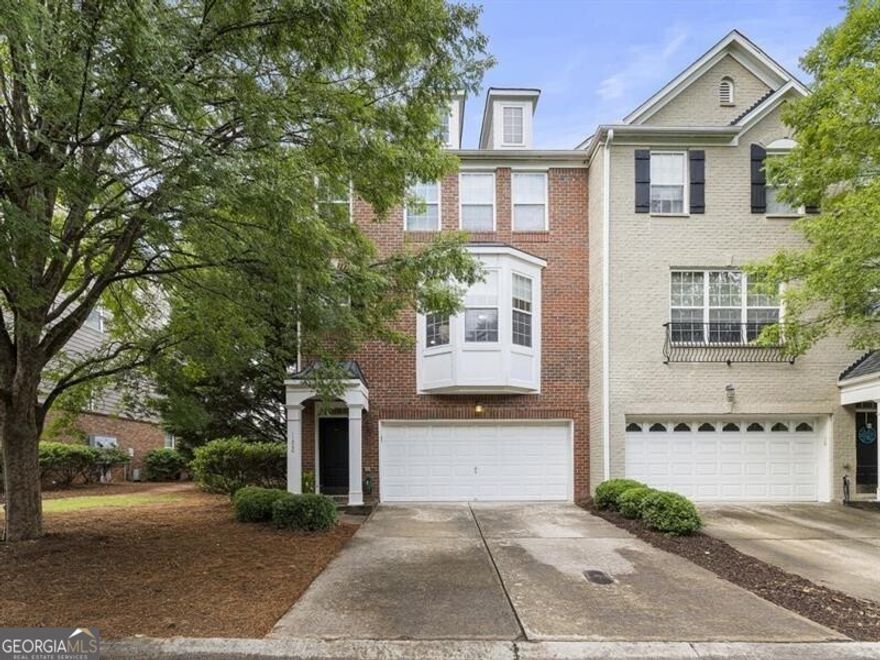 Discover the epitome of modern suburban living in this end-unit brick townhome in the Westside Villas community, ideally situated in a prime Alpharetta location. Enjoy the utmost convenience with proximity to restaurants and retail in downtown, the Avalon and North Point Mall, and nearby attractions such as the Ameris Bank Amphitheatre, Top Golf, and Fetch Dog Park. Benefit from residing within the acclaimed Milton school district, take advantage of the serene trails of Big Creek Greenway and the Alpha Loop, and commute effortlessly with quick and easy access to GA-400. This townhome boasts an open and airy floor plan highlighted by great natural light and gleaming wood floors throughout most of the main level and downstairs. The kitchen features high-end stainless steel Samsung appliances and overlooks the adjacent family room that welcomes with an inviting fireplace. This unit is also one of very few in the neighborhood with a sunroom, a versatile space that can serve as a home office, play area or additional sitting room, and the back deck offers an ideal spot for outdoor relaxation. Upstairs, the primary suite promises tranquility with a generous walk-in closet and a private, updated bathroom featuring a spacious frameless shower. Additional bathrooms throughout the home have also been tastefully renovated to feature large showers, enhancing both style and functionality. The terrace level expands the home's versatility with a full bathroom and a flexible bonus space adaptable as a guest retreat, media room, home office or gym - offering endless possibilities to suit your lifestyle. Convenience continues with a 2-car garage for easy parking and storage. Don't miss the opportunity to make this sophisticated end-unit townhome your own and experience Alpharetta living at its finest.