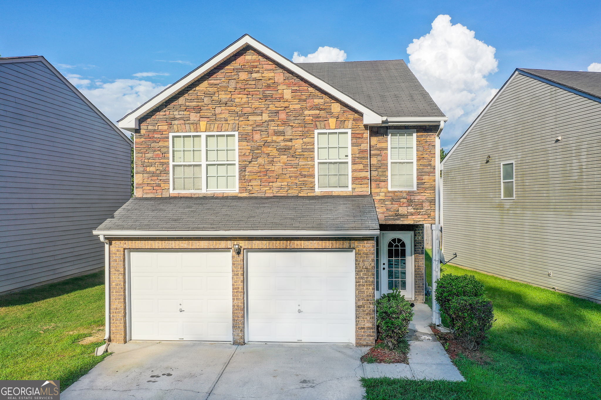 Welcome to this beautifully maintained 4-bedroom, 2.5-bath residence with newly renovated granite countertops in the kitchen, where comfort meets convenience just minutes from Hartsfield-Jackson International Airport. From the moment you step into the striking two-story foyer, you'll be captivated by the home's thoughtful layout and inviting atmosphere. The heart of the home features a spacious living area complete with a cozy fireplace, ideal for relaxing evenings or entertaining guests. Soaring vaulted ceilings throughout the main living spaces and bedrooms add an extra layer of openness and natural light, creating a warm, airy ambiance. The expansive owner's suite is a true retreat, boasting a generous walk-in closet and a luxurious en-suite bathroom with a separate garden tub and walk-in shower-perfect for unwinding after a long day. Whether you're hosting gatherings or enjoying quiet moments, this home offers the space and flow to suit any lifestyle. Conveniently located with easy access to major highways, shopping, dining, and Atlanta's busiest airport, this property combines the best of suburban serenity and urban accessibility. Don't miss this opportunity to own a move-in ready gem in a prime location!
