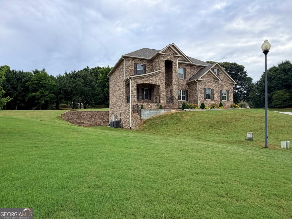 Photo of 40 Granville Lane, Covington, GA 30016 (MLS # 10790654)