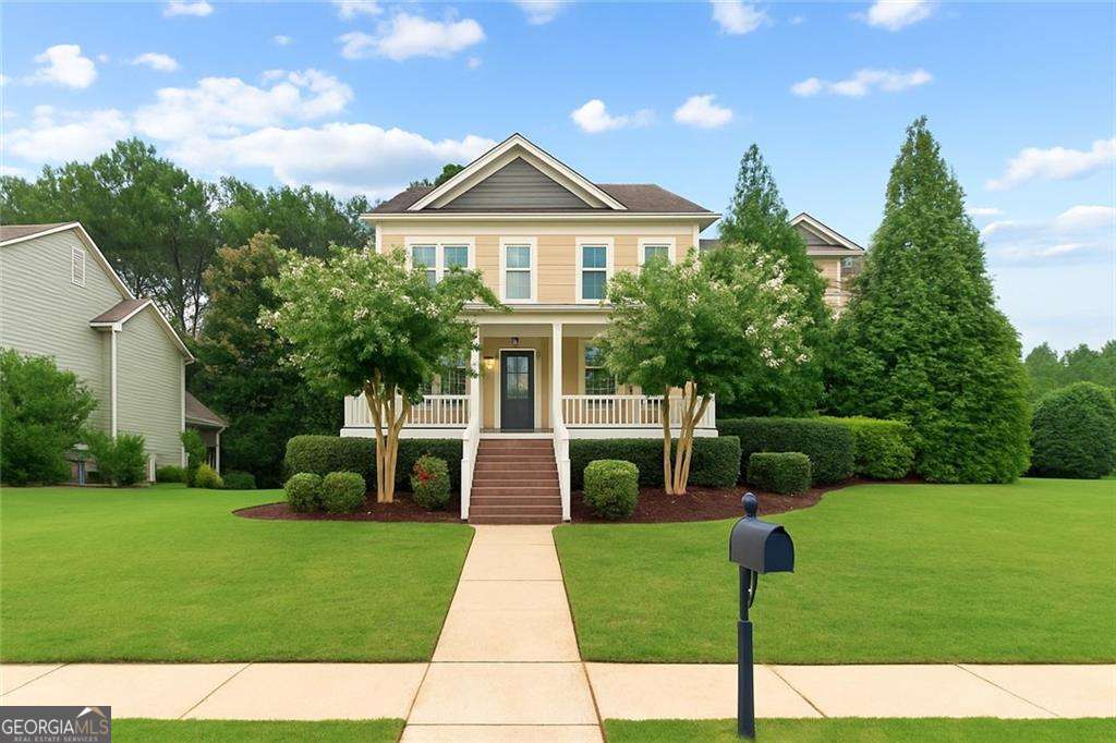 Welcome home to Legacy at the Riverline, where timeless Southern charm meets modern convenience. This beautifully updated 5-bedroom, 4-bath home is tucked away on an oversized cul-de-sac street lot in one of the neighborhood's most desirable locations. From the moment you step onto the covered front porch, you'll feel the warmth this home has to offer. Inside, you'll be greeted with fresh paint throughout and gleaming espresso-stained hardwood floors that set the tone for elevated living. Main Level Magic: The heart of the home is the chef's kitchen featuring real wood cognac cabinetry, stone counters, stainless steel appliances, a walk-in pantry, and a five-foot island, perfect for busy mornings or casual gatherings. The breakfast area flows seamlessly into the fireside family room with custom built-ins and onto a screened porch overlooking one of the best backyards in the neighborhood. The entry is flanked by a formal dining room and the formal living room, a perfect place to work from home or build your entrepreneurial dreams. Think: flat play space, a professionally landscaped wooded backdrop, and a cozy stone paver firepit area, your private outdoor retreat. And the real gem? A hard-to-find main-level guest suite with a full bath, ideal for visiting family, in-laws, or long-term guests. Do not miss the oversized side entry 2+ car garage. Upstairs Retreats: The second level offers flexibility and comfort with a media/playroom and a serene primary suite with trey ceiling, spa-inspired bath with jacuzzi tub, double vanities, and an enormous walk-in closet. You'll also find a guest suite with a private bath, plus two additional bedrooms with a shared hall bath. Convenience is key with the upstairs laundry room. Community & Location Legacy at the Riverline is a gated John Weiland Signature Community boasting resort-style amenities: swimming pool, tennis courts, playground, fitness center, and clubhouse. All this just minutes to the Silver Comet Trail, and with easy access to Hartsfield-Jackson International Airport and Atlanta's vibrant westside, you'll enjoy the best of both convenience and lifestyle. Why You'll Love It: Fresh updates, the rare main-level guest suite, and one of the community's best backyards make this home stand out. Whether you're a family craving space or a frequent flyer needing quick airport access, this one checks all the boxes.