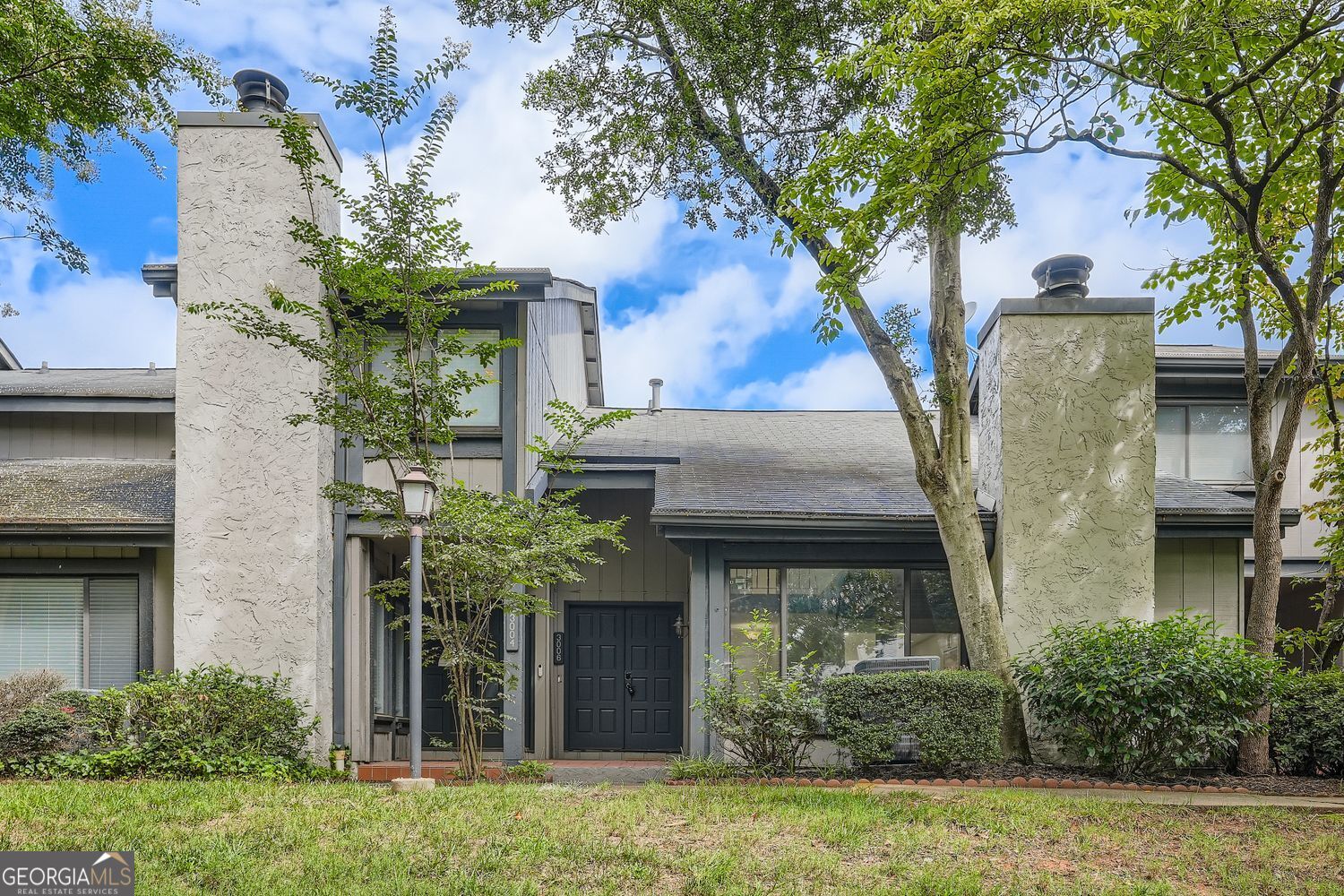 Stunning Fully Renovated Townhome Near The Battery! Welcome to 3006 Balearic Dr SE, Marietta, GA 30067-a beautifully updated condo in a prime location just minutes from The Battery and Truist Park! This move-in ready home features modern upgrades throughout, blending contemporary style with everyday comfort. Step inside to discover brand-new hardwoods, fresh paint, and stylish quartz countertop and updated kitchen that elevate the space. Other updates are new plumbing, HVAC, and roof! The open-concept living and dining area boasts plenty of natural light, creating a warm and inviting atmosphere. Surrounded by nature, the home offers a private epoxy covered balcony with serene views of greenery, creating a perfect spot for relaxation. The Valencia Hills community offers a pool, tennis courts/pickleball, and walking trails to the Chattahoochee River! Don't miss this rare opportunity to own a fully updated home in one of Marietta's most desirable areas. Schedule your tour today!