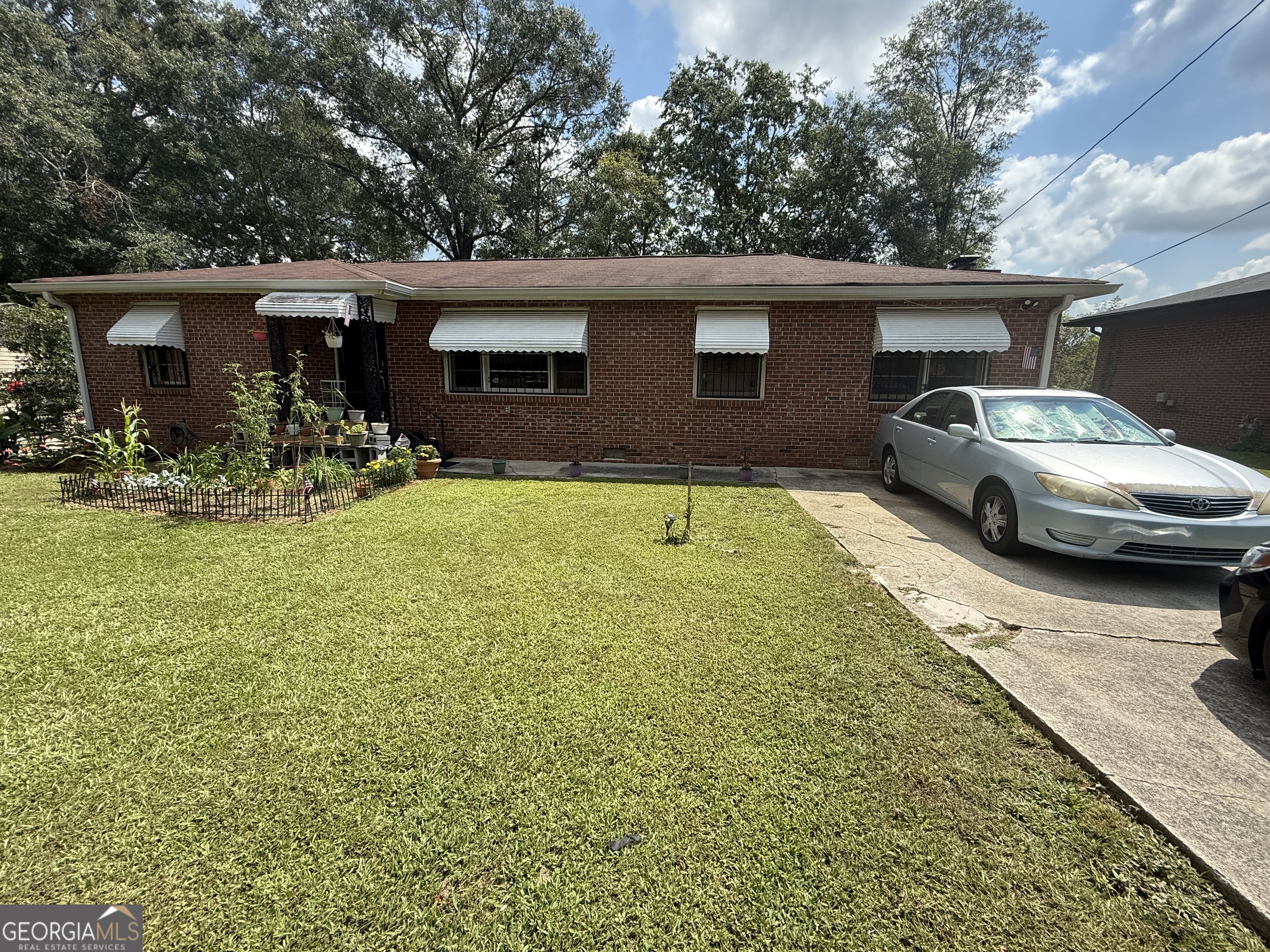 Investor's Dream in Covington! This 3-bedroom, 1-bathroom brick ranch offers 1,306 sq ft of solid potential on a spacious lot. Built in 1954, this full-brick home provides timeless durability and a classic layout ready for your updates. Conveniently located near Covington's growing community and amenities, this property presents a rare opportunity to add instant value with minimal effort. Don't miss your chance to own a highly desirable brick property in a fast-moving market!