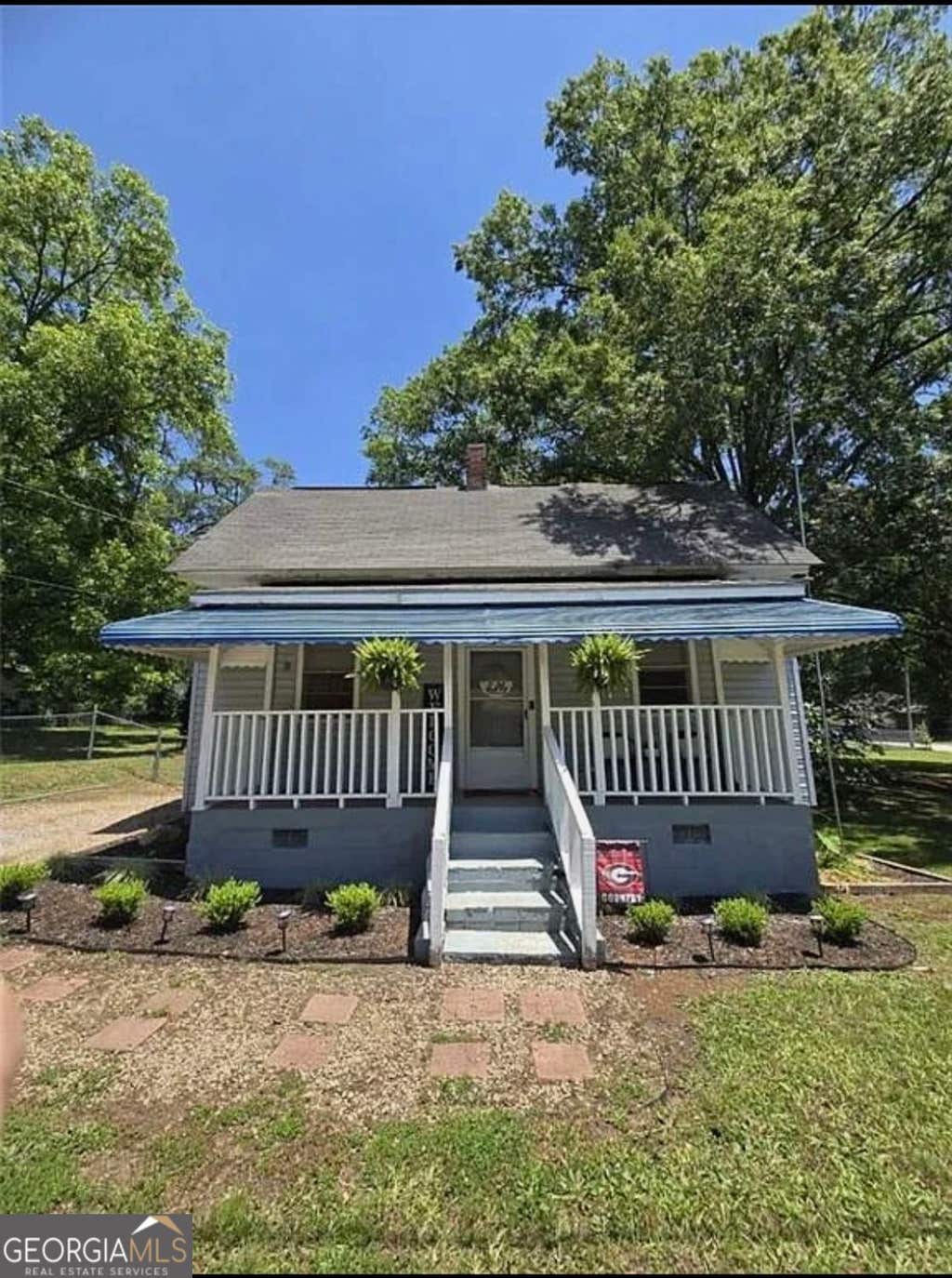 Photo of 5108 Hackett Street NE, Covington, GA 30014 (MLS # 10827031)