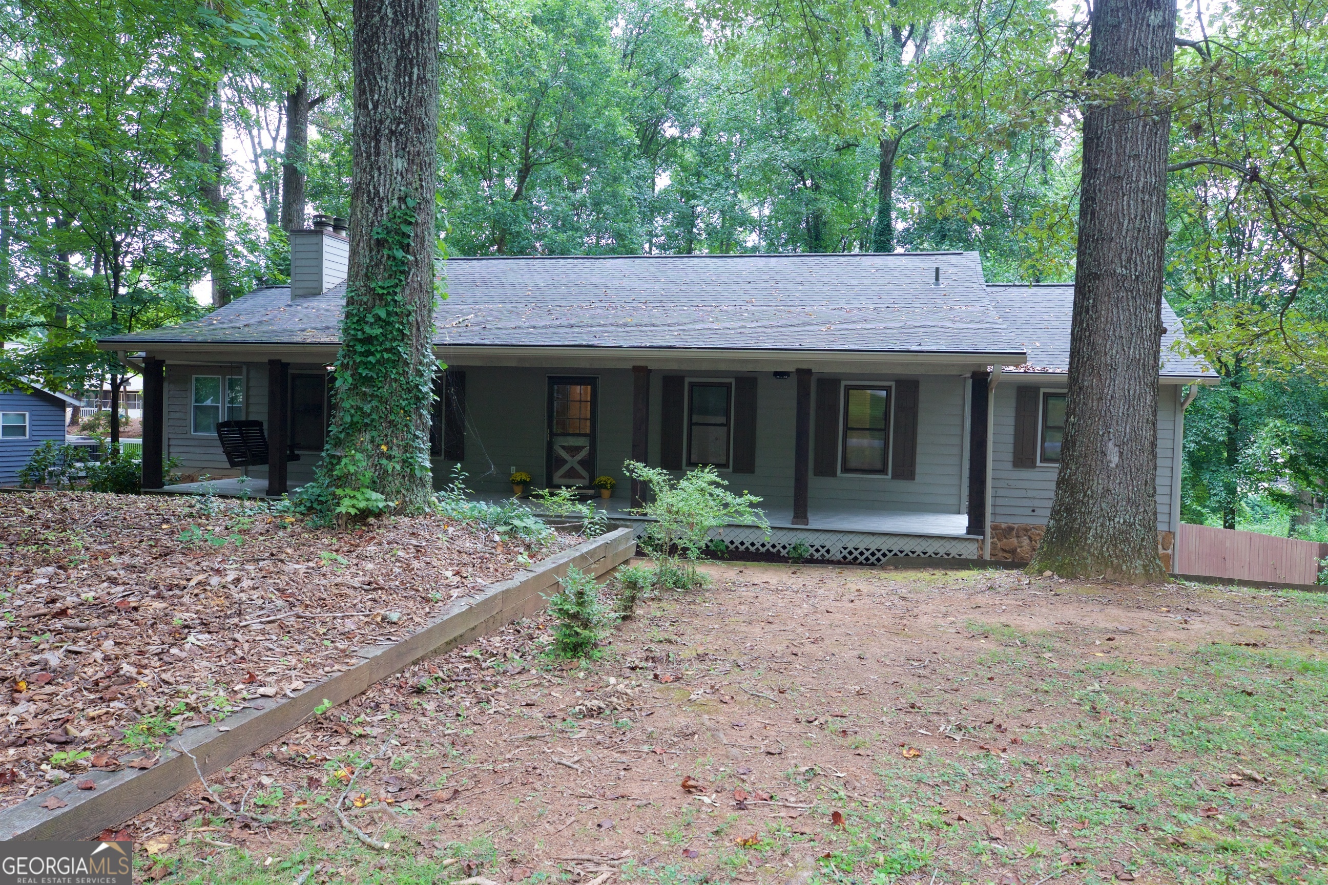 Nestled on a serene, over half-acre lot, this beautifully maintained 4 bedroom/3 Full bath ranch offers both comfort and versatility. Fresh interior paint welcomes you into a bright and inviting space. The screened-in porch-now with new windows, air conditioning, and heat-can be enjoyed year-round. The fully finished basement features a spacious rec room with a cozy fireplace, a bedroom, a full bath, and a large laundry room, making it ideal for guests or multi-generational living. You'll also find ample storage space and a newer water heater for peace of mind. Step outside to the oversized back deck, perfect for entertaining, overlooking a large, flat, fenced backyard. Located in a neighborhood with an optional HOA for pool access and just minutes from I-75, I-575, Lake Allatoona, vibrant Downtown Acworth, Downtown Woodstock, and KSU, this home offers the best of privacy and convenience.