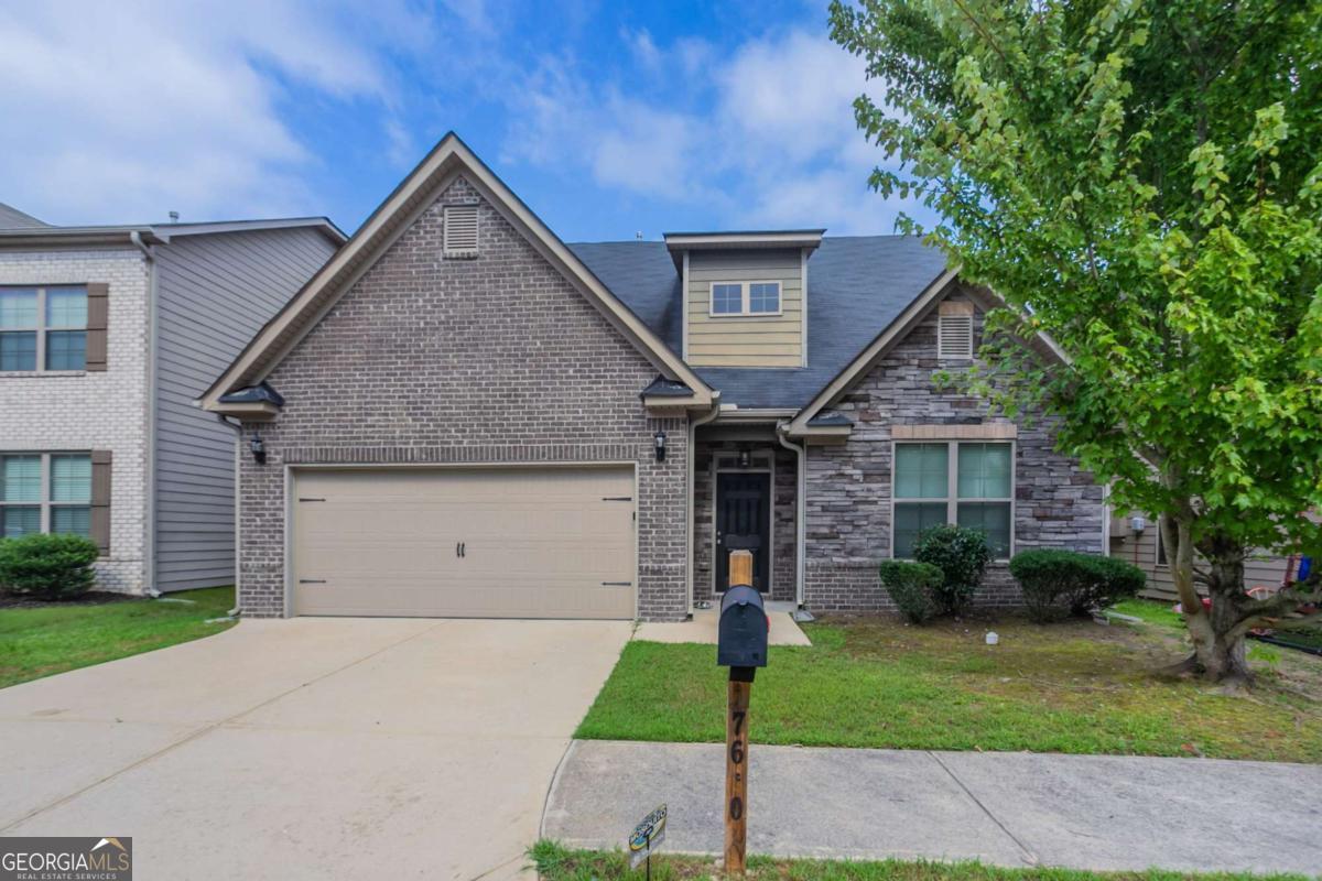 Welcome to this beautifully maintained 4-bedroom, 2.5-bathroom home nestled in the quiet Autumn Lakes subdivision of Fairburn. This spacious two-story residence offers a flexible floor plan with a main-level bedroom perfect for guests or a home office, along with an open-concept kitchen, dining, and living area ideal for entertaining. Upstairs, you will find a generous primary suite complete with a private bath and large closet, plus three additional bedrooms and a shared full bathroom. The home also features a cozy fireplace, second-floor laundry, and an attached two-car garage. Situated on a landscaped lot with curb appeal and community charm, this property provides easy access to I-85, Hartsfield-Jackson Airport, shopping, and Trilith Studios-making it a perfect balance of suburban comfort and metropolitan convenience.