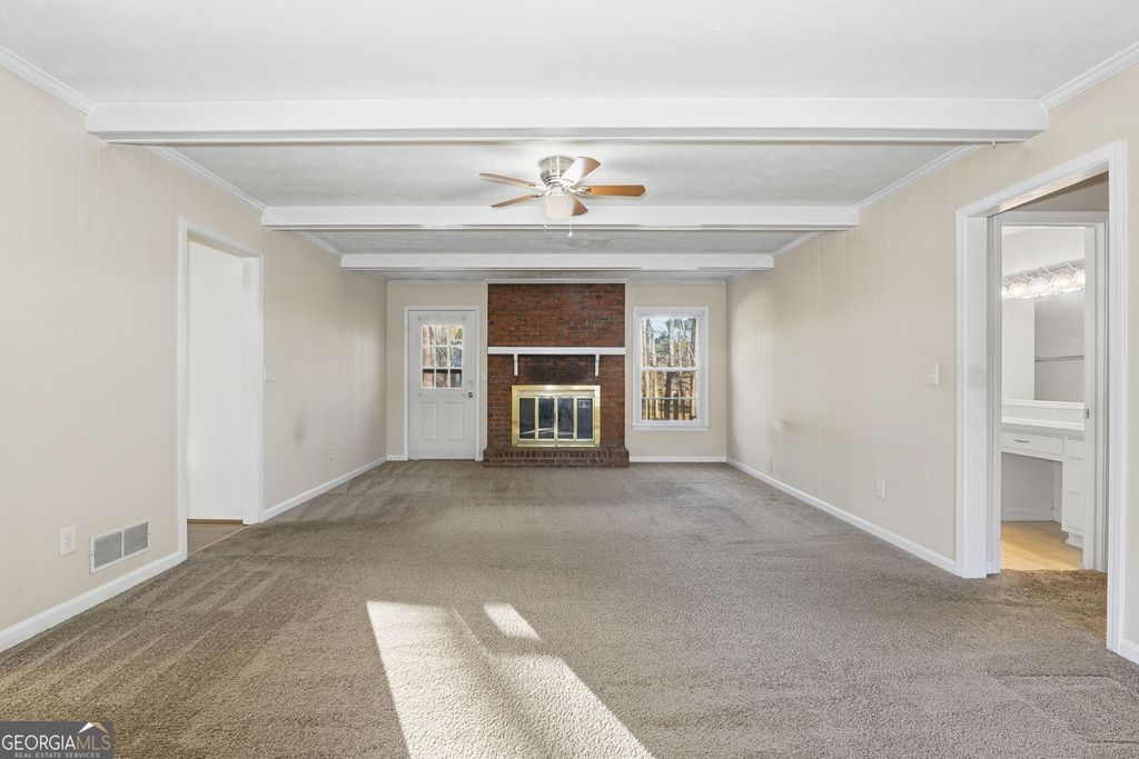 Photo of 566 Sugar Valley Lane SE, Conyers, GA 30094 (MLS # 10668311)