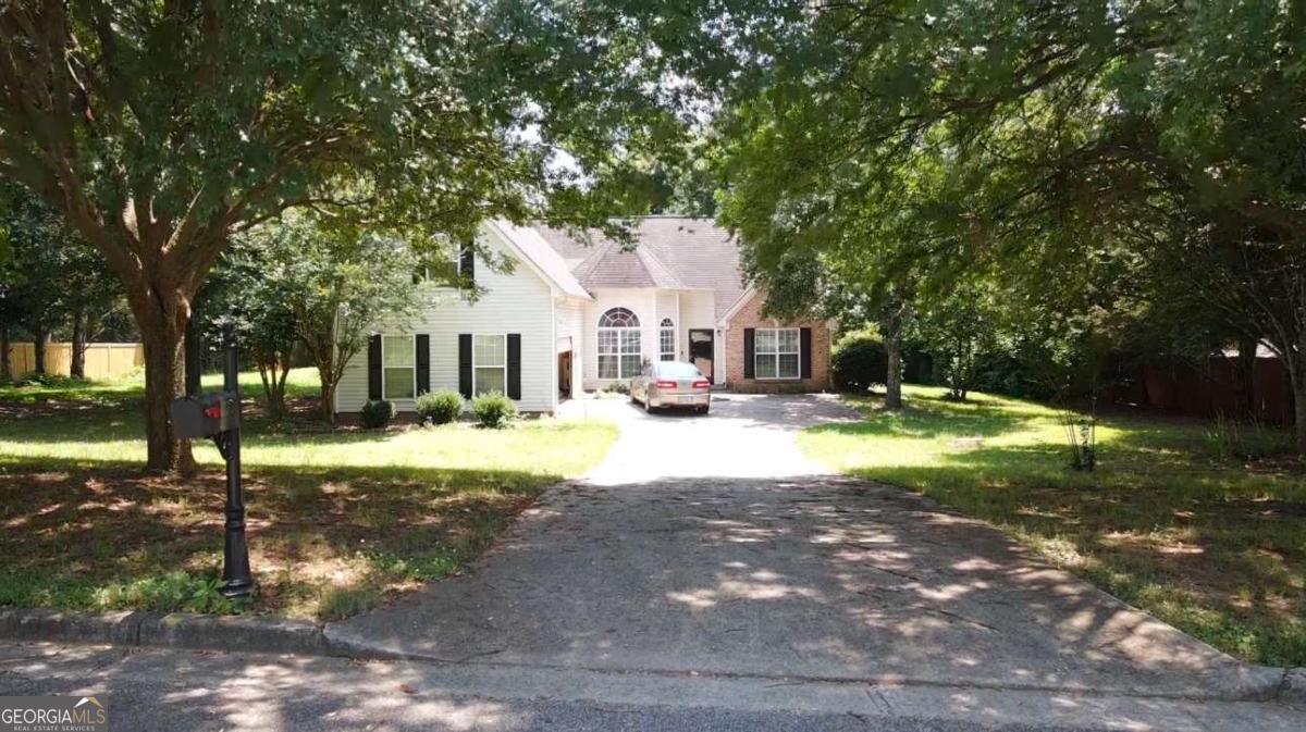 MOTIVATED SELLER - Bring ALL offers! Spacious 4-bedroom, 2-bath, cul-de-sac home on over half an acre with NO HOA - ready for your updates and vision. Featuring vaulted ceilings, abundant natural light, a wood-burning fireplace, bay-windowed dining room, upstairs bonus room with a huge walk-in closet, and an oversized owner's suite with bay windows, trey ceiling, soaking tub, and double vanities - this home is packed with potential. Upstairs includes a flexible 4th bedroom, perfect for an office, gym, or guest suite. Recent updates include a newer architectural roof and professionally cleaned air ducts. The backyard is a private, level canvas - ideal for creating your dream outdoor space. Home needs cosmetic TLC, but it's not a full fixer-upper - just waiting for your personal touch. Great opportunity for first-time buyers or investors looking for value and upside in a prime location near University Parkway, shopping, dining, and schools. Pre-listing inspection available! Seller is motivated!
