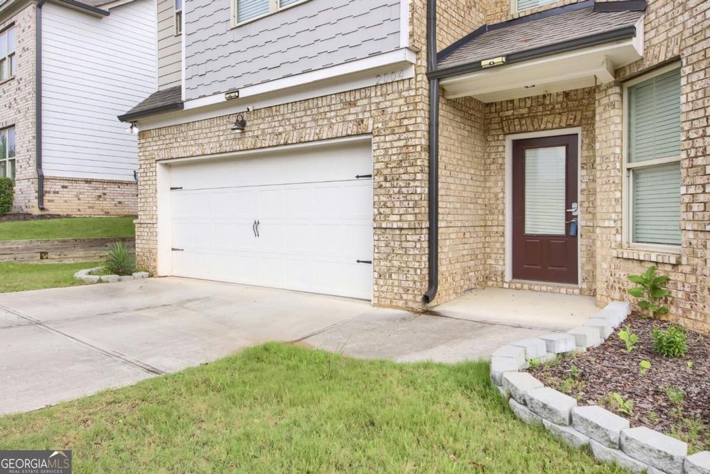 Photo of 2004 Brittlebank Lane, Lawrenceville, GA 30043 (MLS # 10753608)